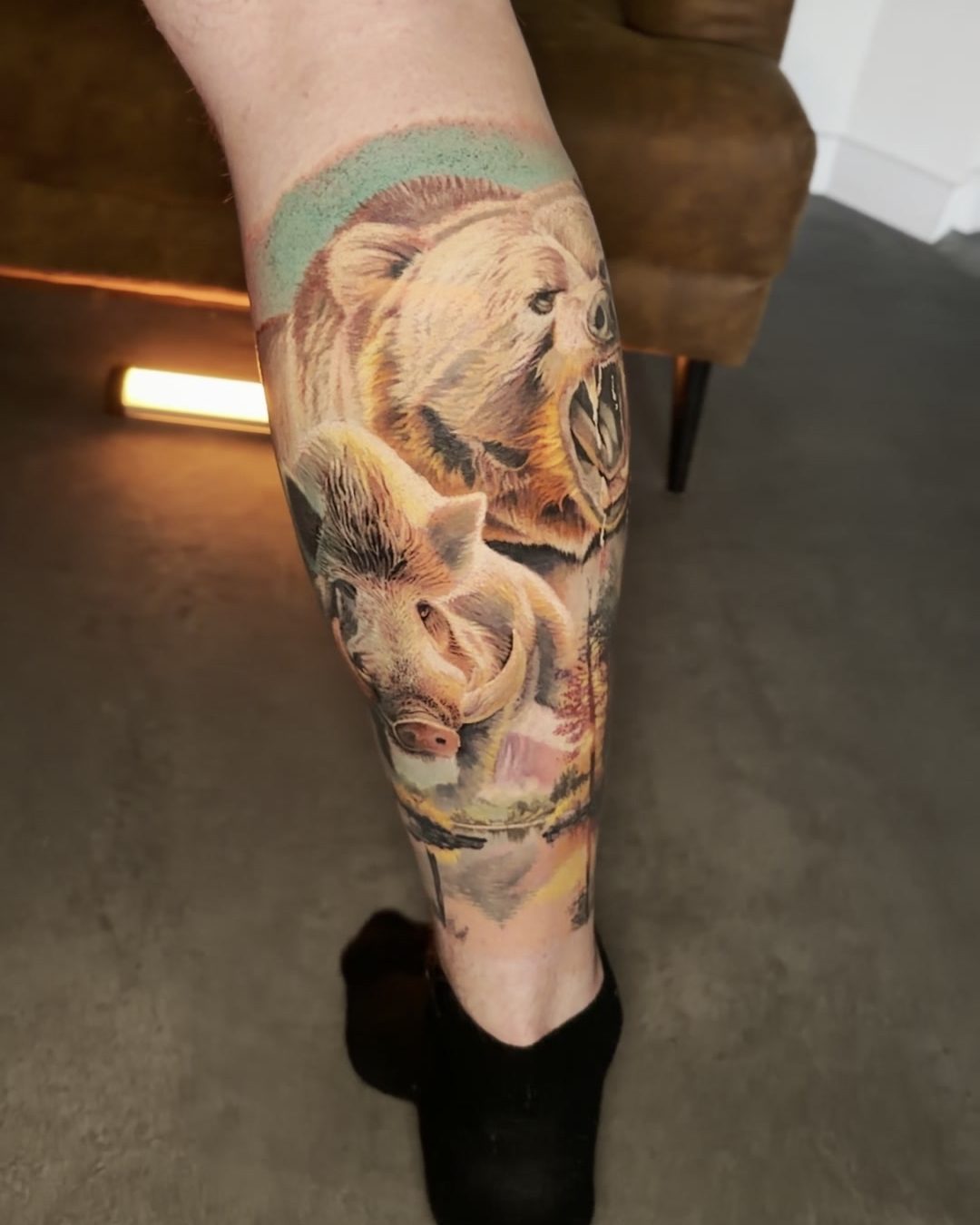 Result - Finished piece: a bear and a boar in colour realism.